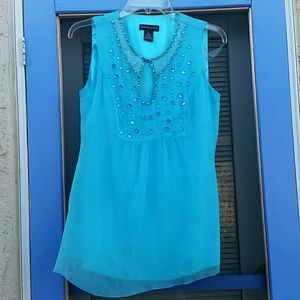 Jeweled light blue sleeveless silk blouse